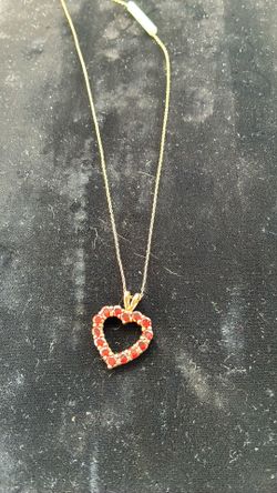 Sterling, silver and garnet heart shaped pendant and chain