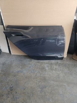 17-23 Tesla Model 3 right rear door shell oem