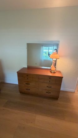 Dresser with a mirror