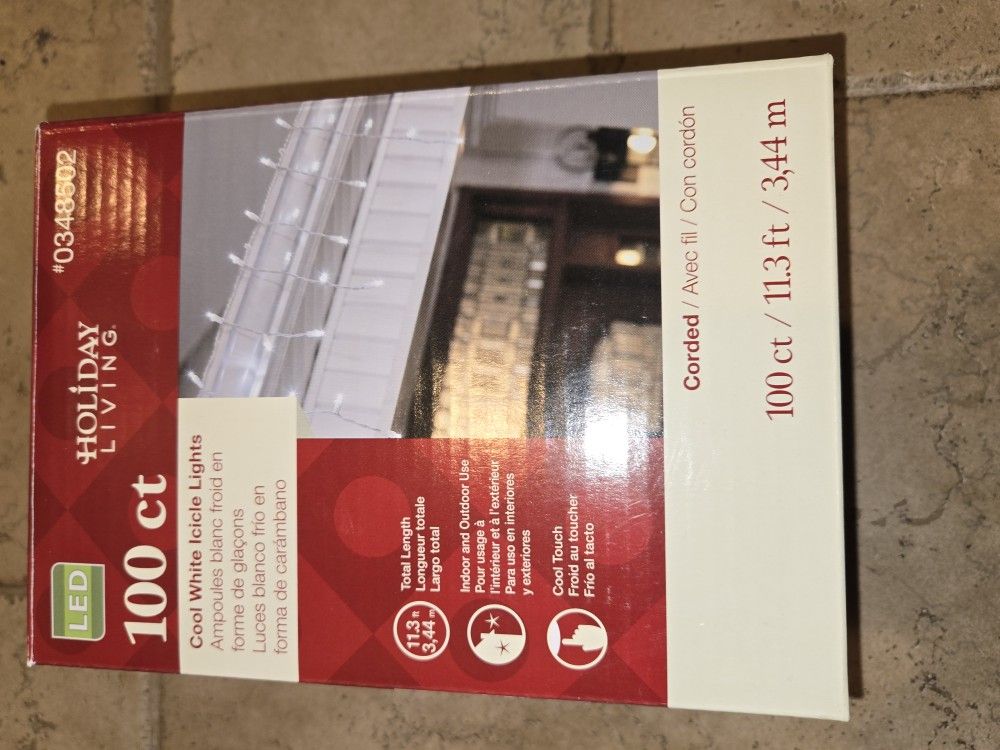 New in the box LED Cool White icicles lights 8 sets