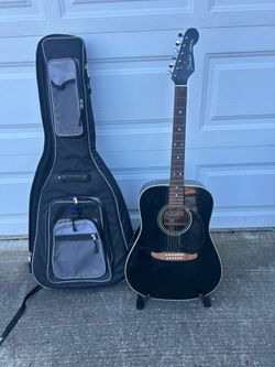 Fender Catalina acoustic guitar in decent shape. Has minor scratches on the back from a belt buckle the front looks good however. Manufactured in Kore