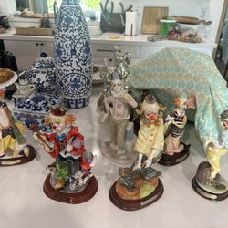 antique jester old style statues