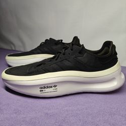 Size 11 US Adidas adiFOM TRXN men's sneakers in core black and white. UNISEX 