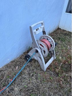 Garden hose reel, and hose.