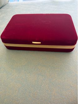 Elegant red and gold soft velvet jewelry box clutch Approx 9” x 6” x 2” Perfect for storing your precious items. This is in great condition for its ag