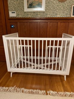 West Elm x Pottery Barn Kids Mid-Century Convertible Crib + Toddler Conversion Kit + Mattress – $300