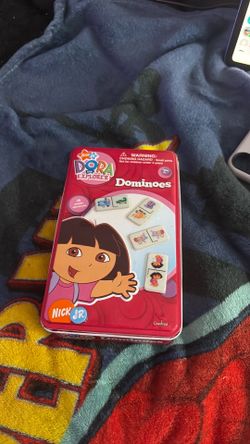 Dora themed dominoes age is five and up 28 plastic dominoes missing one