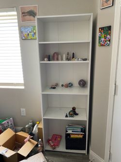 White tall book shelf