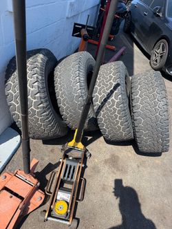 4 wheels with BF-Goodrich all terrain and one brand new spare
