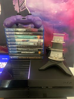 Sony PlayStation 4 Console Bundle with Controller, 10 Games, and Charging Dock