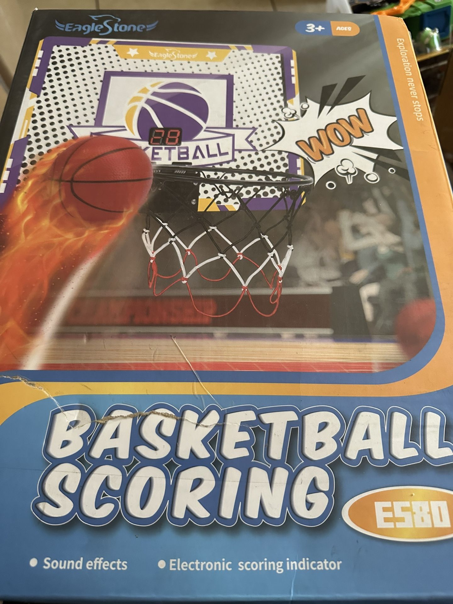 Electronic basketball hoop scoring play set. Comes with pump and 4 balls. Open box item box is damaged
