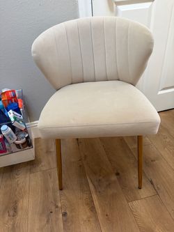 Cream and gold chair
