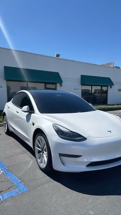 Meet Tesla sport sedan  model 3,white color
