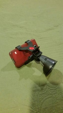Dashboard /windshield smartphone holder.