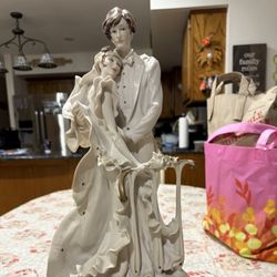 Armani Statue Lady And Man 