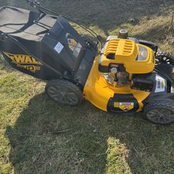 New Dewalt Self Propelled Mower Commercial Grade 196cc Engine With 21” Mowing Deck Width.