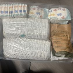 223 Diapers Size Newborn and 1
