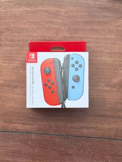 BRAND NEW (Sealed) Nintendo Switch Joycons - Neon Red/Neon Blue