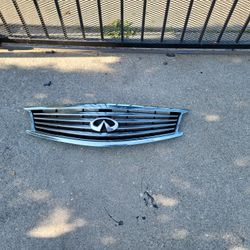 10-15 INFINITI G37 Q40 SEDAN FRONT BUMPER UPPER GRILLE CHROME W/ EMBLEM # 77446

