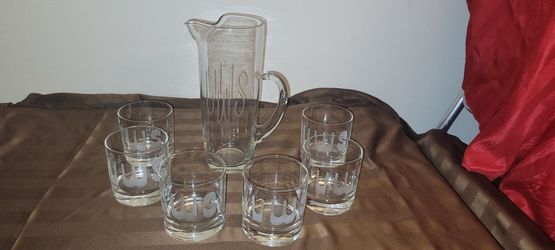 MONOGRAMMED GLASS PITCHER WITH 7 GLASSES.