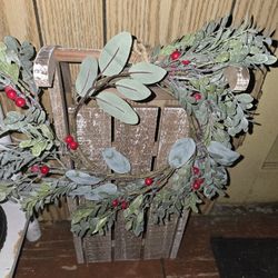 Distressed Wooden Decorative Sleigh with Wreath