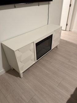 Tv stand with electric fire