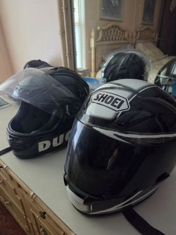 2 motorcycle helmets