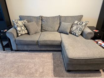 Couch w/ decorative pillows