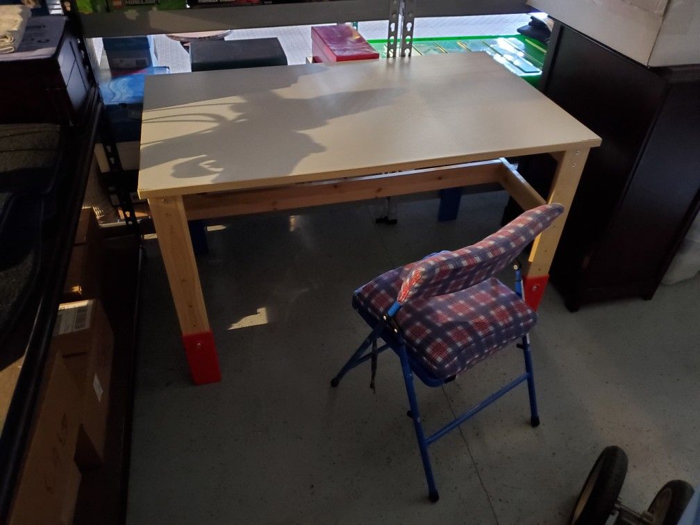 iKea table and chair. Adjustable height for kids