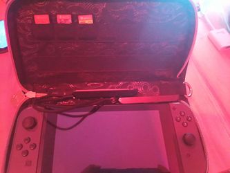 Nintendo switch with games and charger