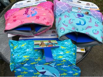 Puddle jumpers life jackets. New.