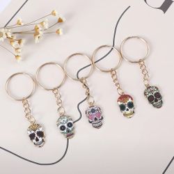 Brand New 5 Piece Skull Spooky Sparkly Keychains Set 