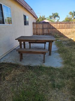 All wood hand built picnic table