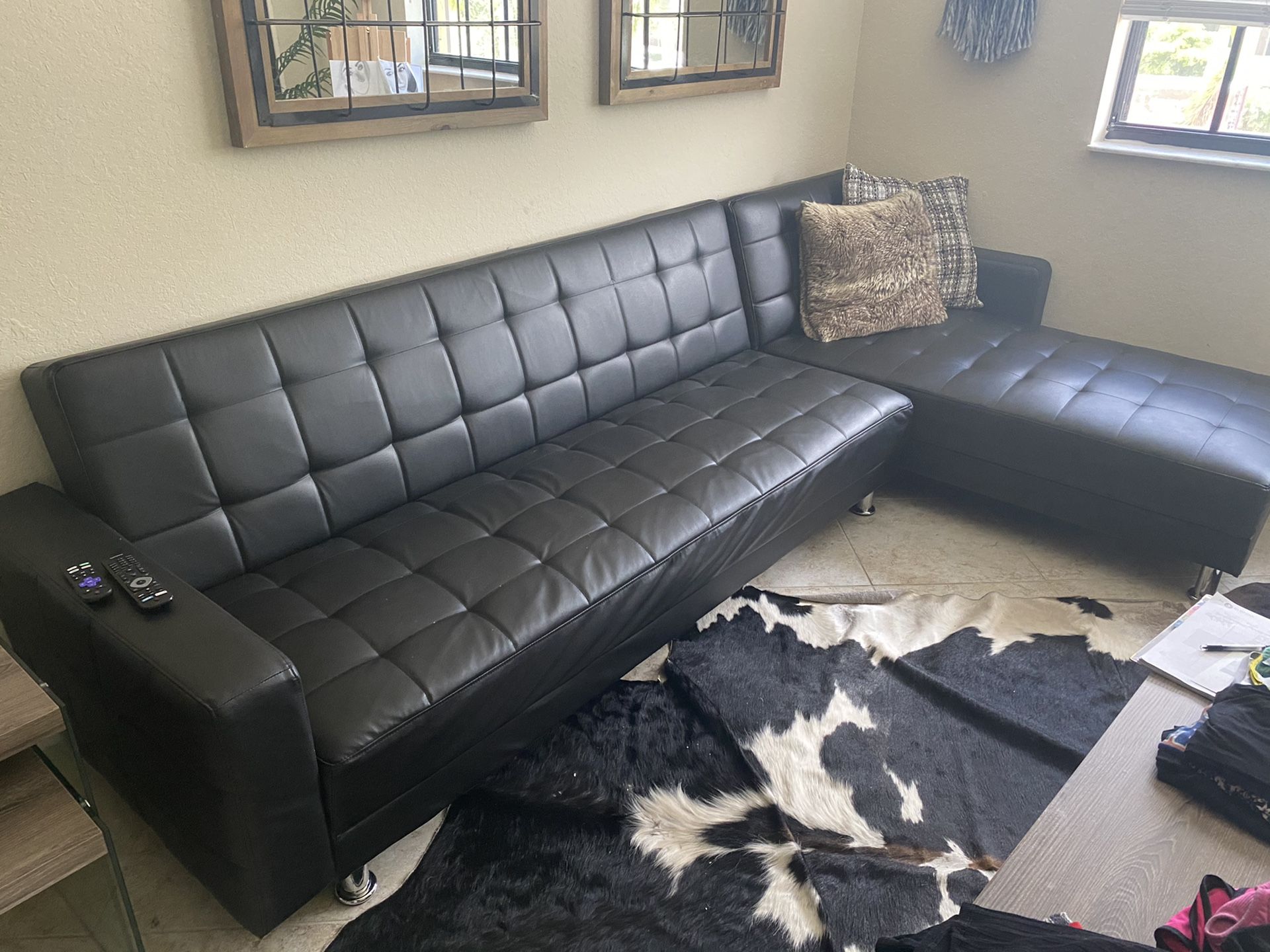 Black leather convertible sofa