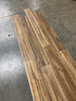 Waterproof flooring padding attached