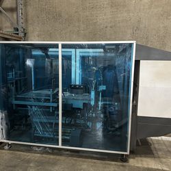 Plastic wrapping machine