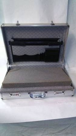 10 New Aluminum Frame Briefcases with foam Inserts $80.00 for all 10. ($18.00 each if you buy less than 10).