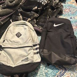 Black Nike Backpack And Adidas Teal Backpack 