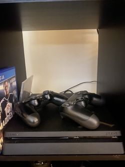 ps4 console, 2 Controllers, 3 Video Games (Madden 18, The Walking Dead, Hitman). Condition is "Used" - like new, great condition