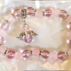 Rose Quartz Beaded Bracelet Features An Angel 