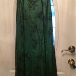 Long strapless emerald green and black sheer dress