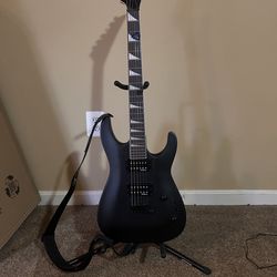 Jackson guitar, orange crush amp, two pedals