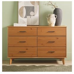 Mid-century Modern wood dresser with metal handles