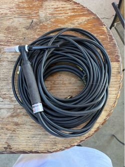 Welding torch with hose
