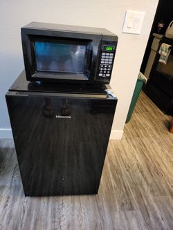 Compact refrigerator and microwave