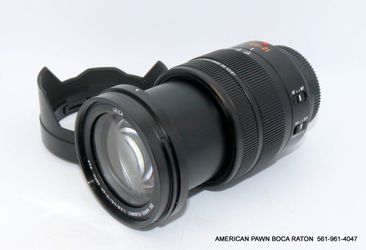 Panasonic LEICA DG VARIO-ELMARIT 12-60mm F2.8-4.0 ASPH. POWER O.I.S. Micro Four Thirds Lens Used Has light normal wear Excellent cosmetic condition Cl