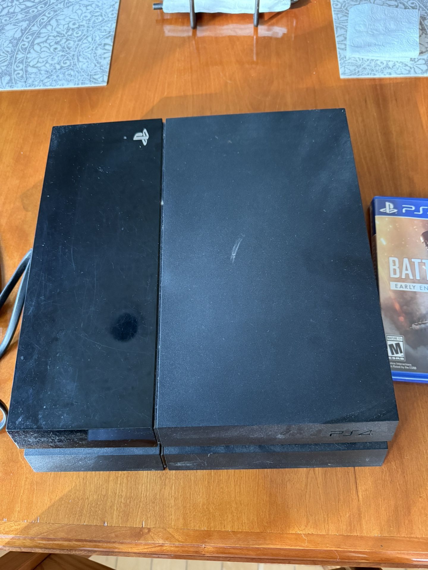 Playstation 4 w/ power cable, HDMI and 2 games