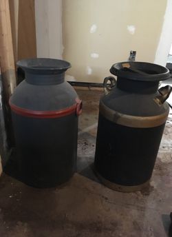 Two old milk cans