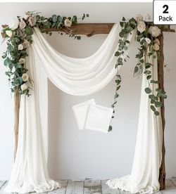 Ivory chiffon drapery and sage green gauze table runners