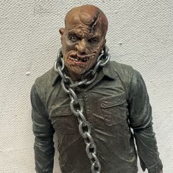 This is a figurine of Jason Voorhees from the movie "Friday the 13th